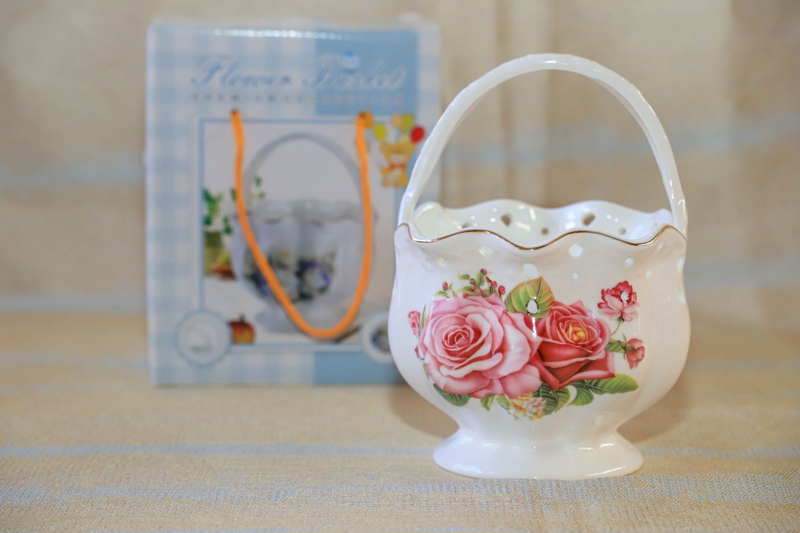 1pc bone china basket,this basket can be used as a home decor for flowers can also be used as a cutlery organiser.its made of high quality bone china which does not chip off even when used for years