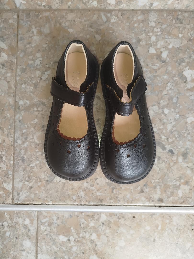 Quality school shoes, made of leather, easy to buckle and clean. It has rubber sole and very beautiful.  The leather material makes it's long lasting.
