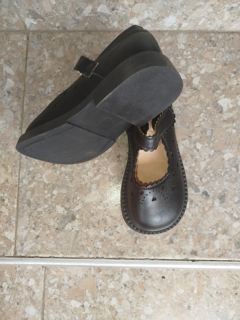 Quality school shoes, made of leather, easy to buckle and clean. It has rubber sole and very beautiful.  The leather material makes it's long lasting.