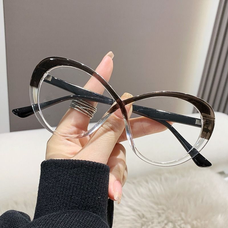 ustomized Fashion Anti Blue Light Blocking Glasses Oval Cross Design Cheap Plastic Glasses for Women 1PC