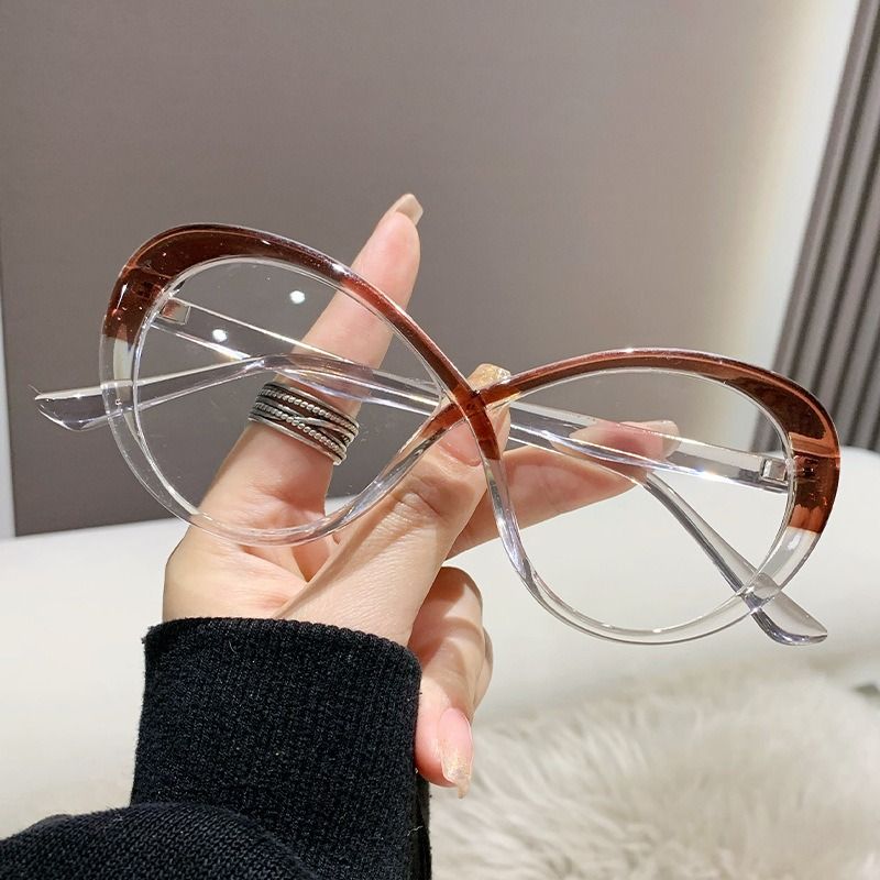 ustomized Fashion Anti Blue Light Blocking Glasses Oval Cross Design Cheap Plastic Glasses for Women 1PC