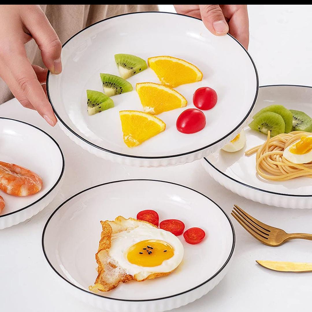 Bring timeless beauty and modern simplicity to your dining table with our Japanese White Ceramic Plates, inspired by authentic Japanese minimalist design. Perfect for turning every meal into a fine-di