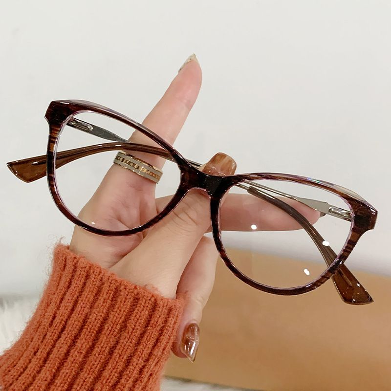Fashion Accessories > Accessories > Women Accessories > Sunglasses & Eyewear Accessories > Sunglasses  European & American Retro Cat Eye Glasses Spring Hinge Blue Light Blocking Flat Lenses