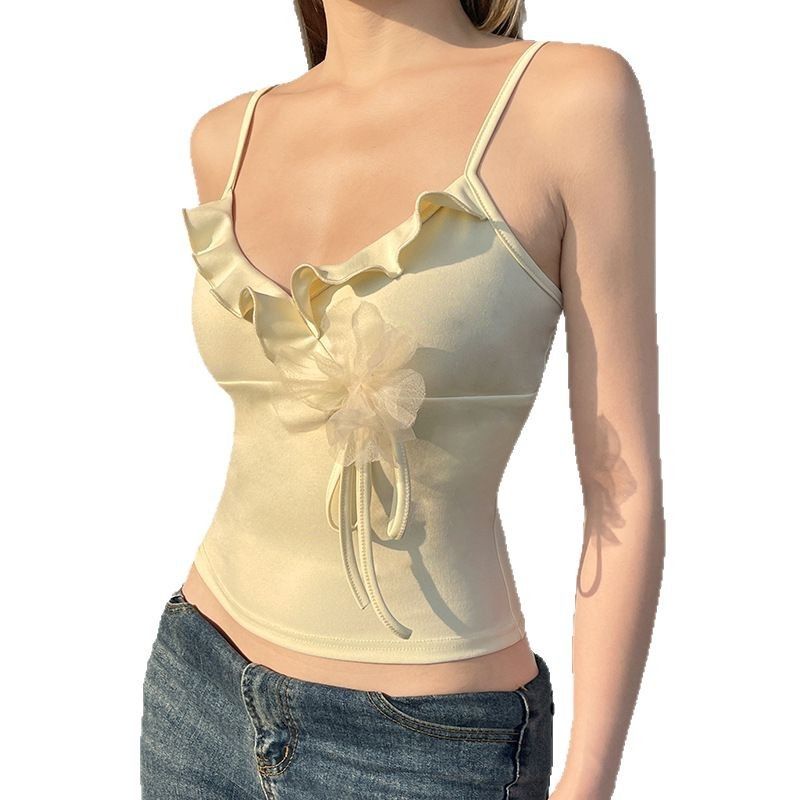 Clothes > Women's Clothing > Tops > Tanks & Camis (Tank Tops) Vacation style sweet solid color ruffled V-neck suspender vest with flower decoration waist top