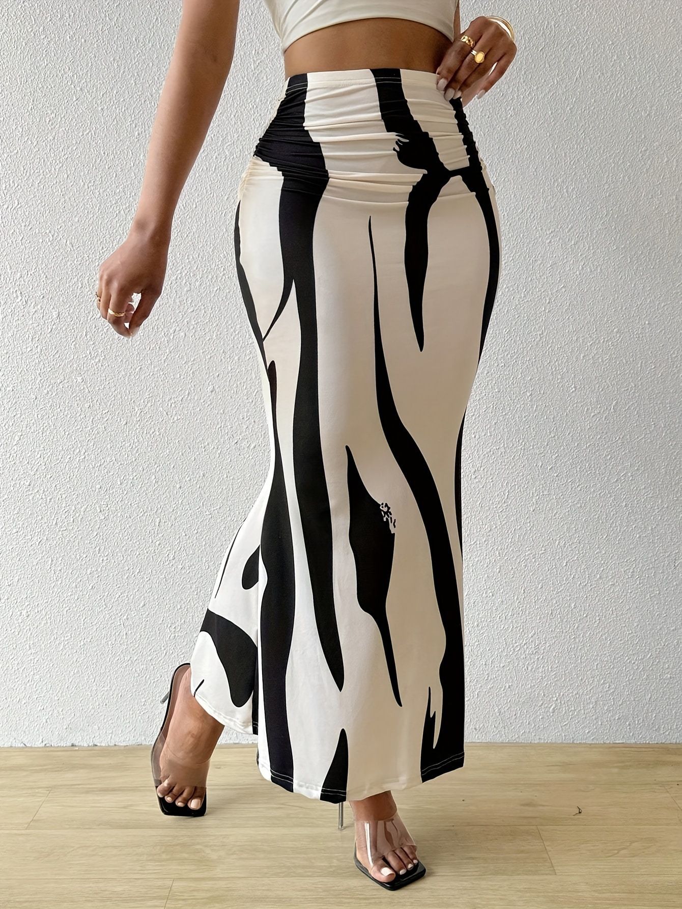 Clothes > Women's Clothing > Bottoms > Skirts  European and American zebra pattern to make you look slim and tall, hot selling half-body tight high waist fish tail pencil long skirt