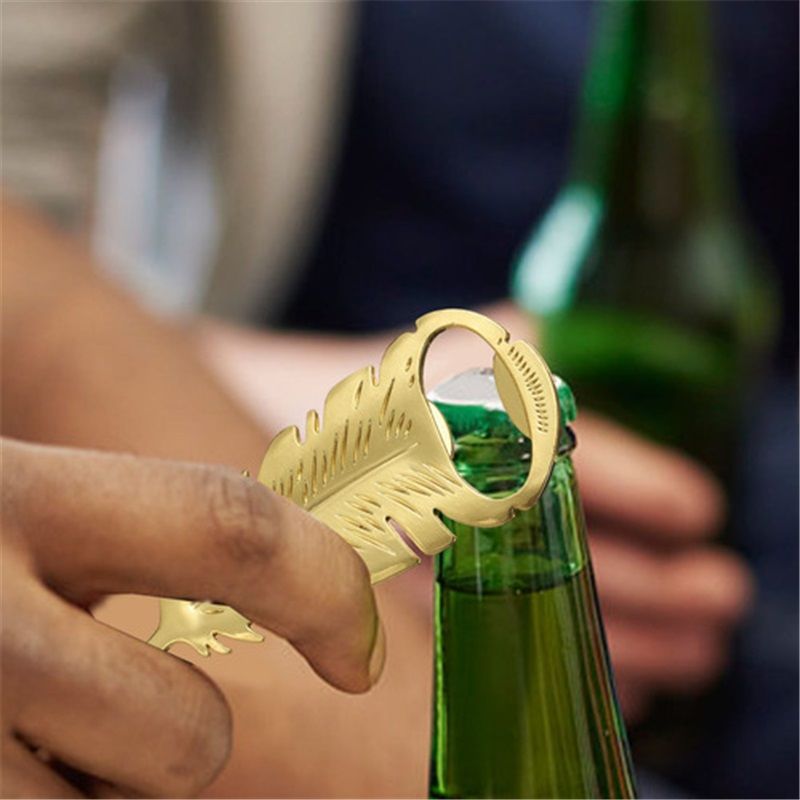 Home & Kitchen > Kitchen & Dining > Wine Accessories > Corkscrews & Openers  Small Golden Feather Bottle Opener Gift