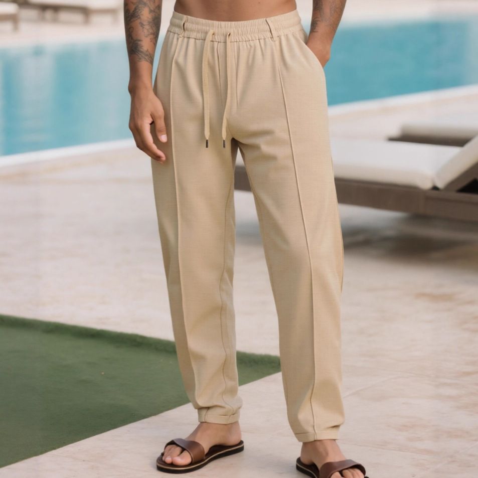 Clothes > Men's Clothing > Bottoms > Pants > Casual  Spring and summer solid color casual trousers, sports pants, men's loose woven men's trousers