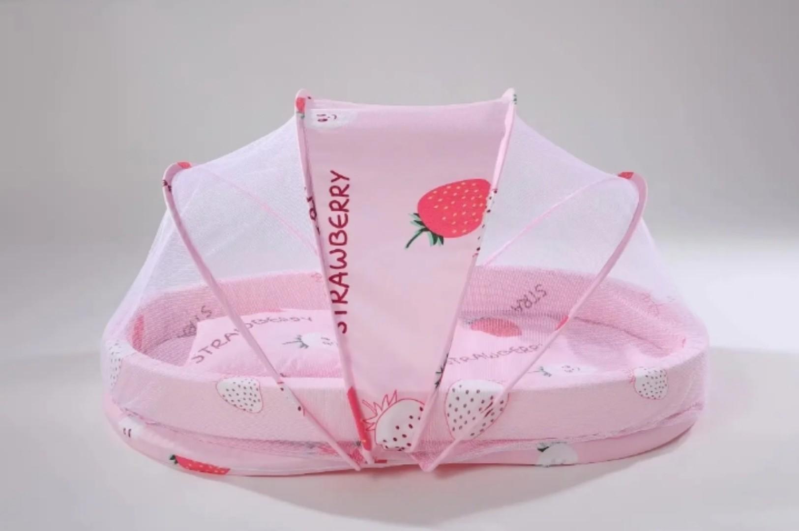 Portable baby bed with an integrated mosquito net head pillow designed for infant sleep and protection