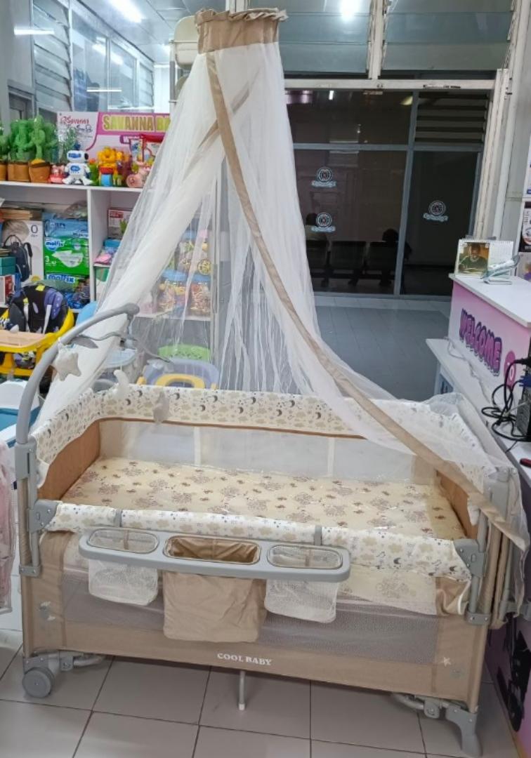 CoolBaby 8-in-1 Multifunctional Cotton Cosleeper Playpen with Mosquito Net, Toys & Free Mattress