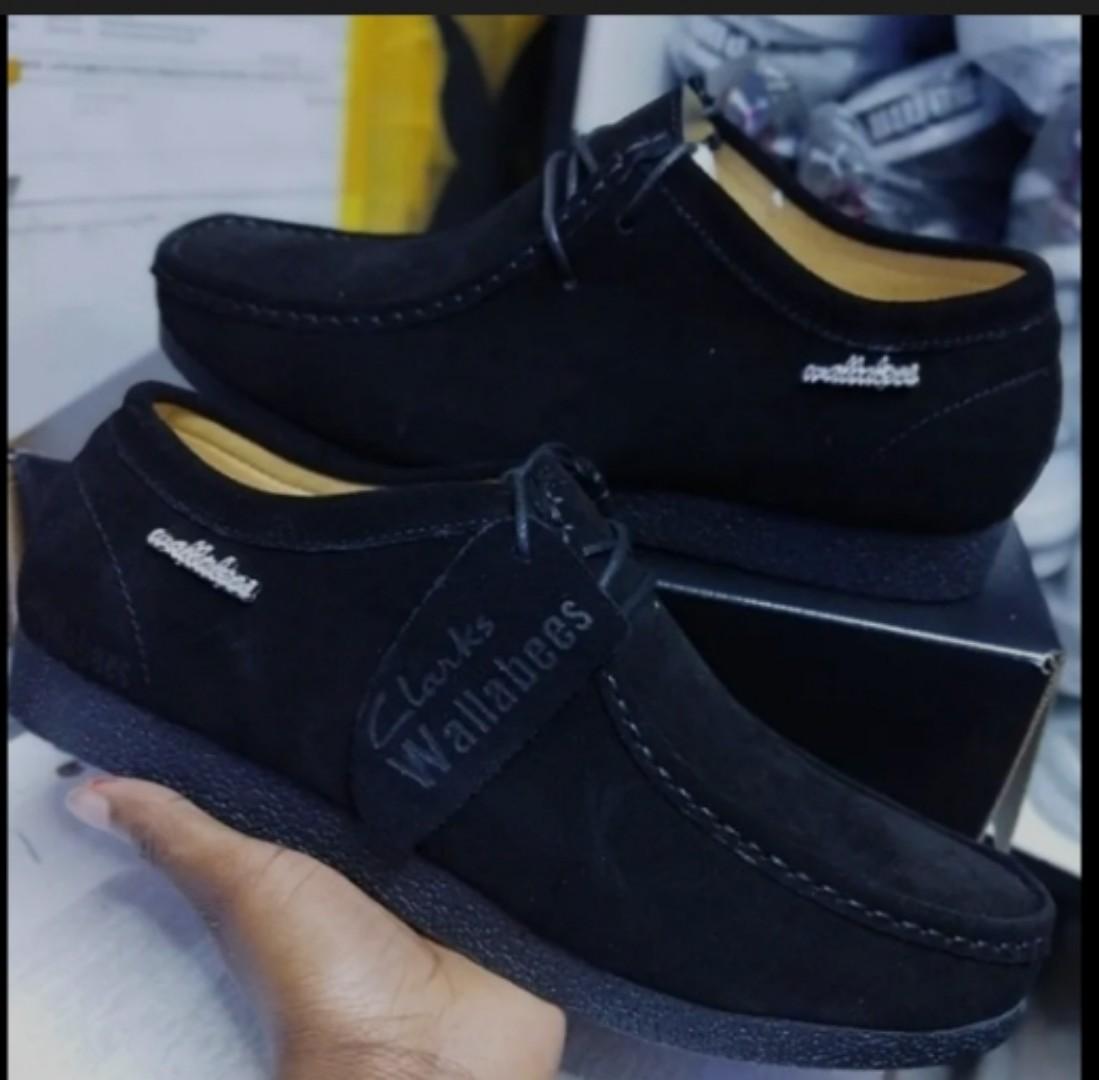 Clarks Wallabee Shoes – Timeless Comfort and Style"Description:Iconic Design: Features a classic moccasin-inspired silhouette for a unique, timeless look.Premium Material: Made from high-quality suede