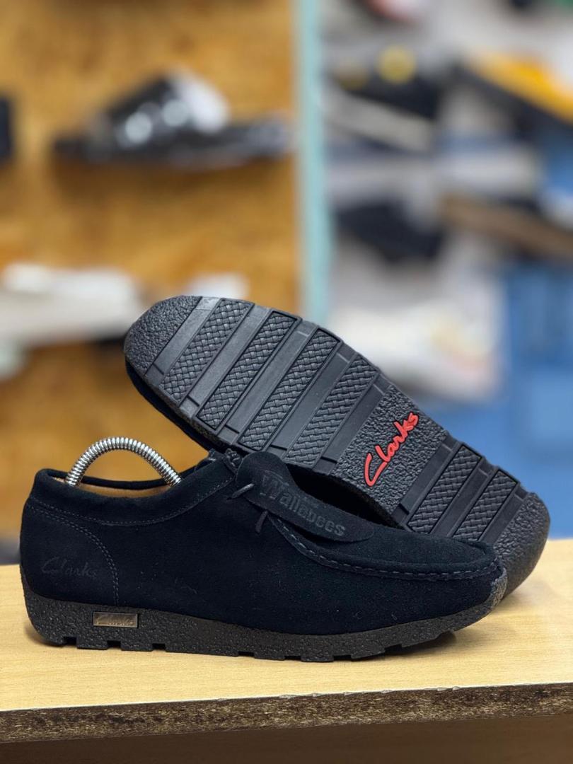 Clarks Wallabee Shoes – Timeless Comfort and Style"Description:Iconic Design: Features a classic moccasin-inspired silhouette for a unique, timeless look.Premium Material.