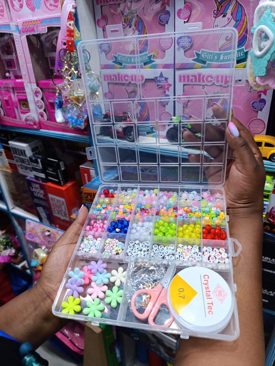 BEADS. Jewellery making beads. This bracelet making kit is stored in a box, which prevents it from being scattered and easy to carry, shiny and colorful with a smooth surface.