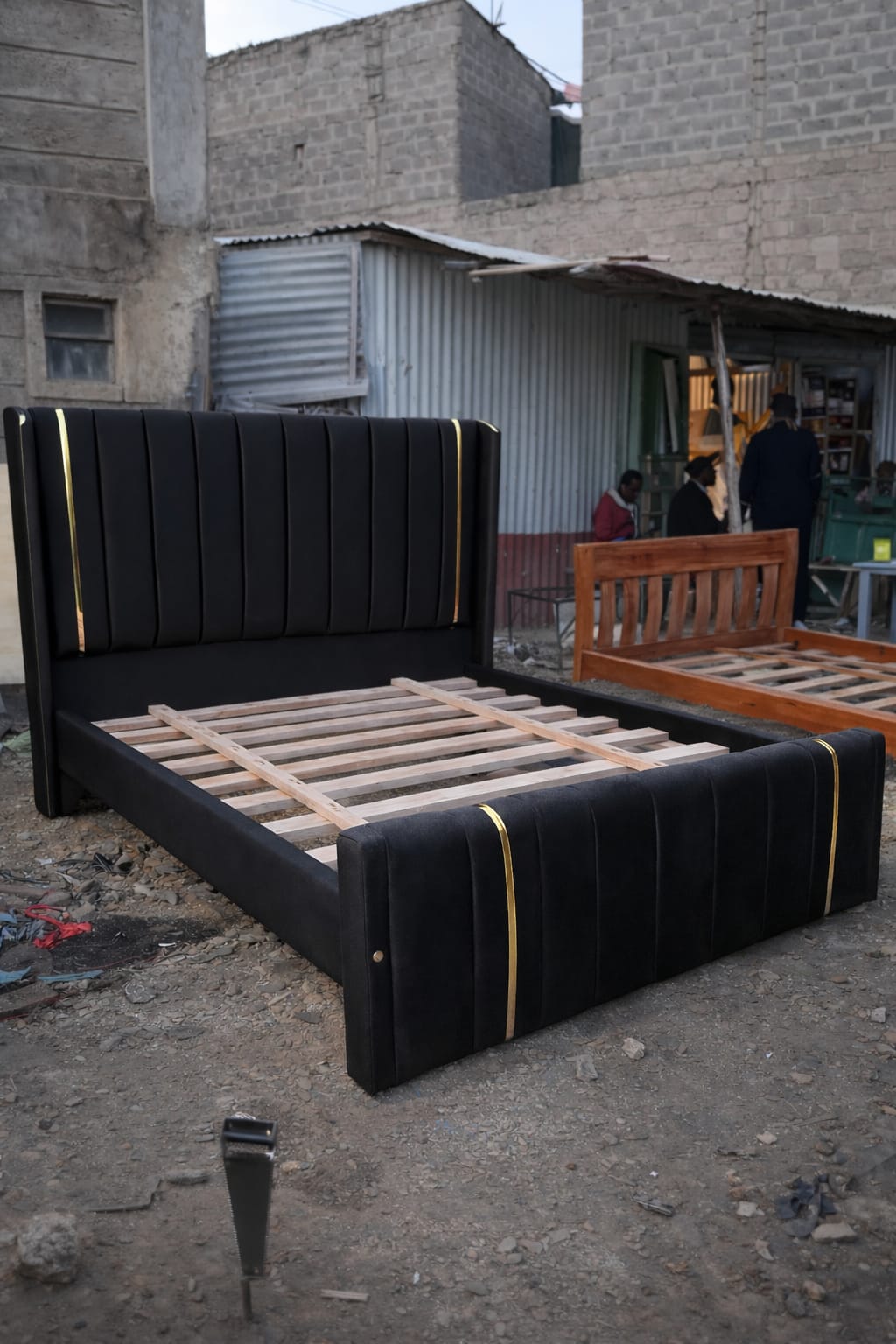 (OFFER!!!) Modern Upholstered Bed Frame – Black/Beige/Brown/Grey Velvet with Vertical Panel Design & Golden Accent Straps (Without mattress) 4*6ft, 5*6ft & 6*6ft Made In Kenya