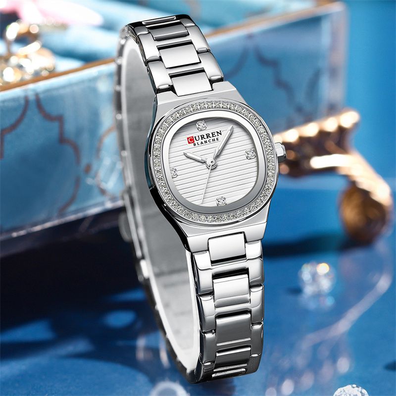 CURREN New Luxury Women's Watch: Diamond-Encrusted Small Oval Dial Stainless Steel Strap Water-Resistant Quartz Watch – Business & Casual Goddess Timepiece