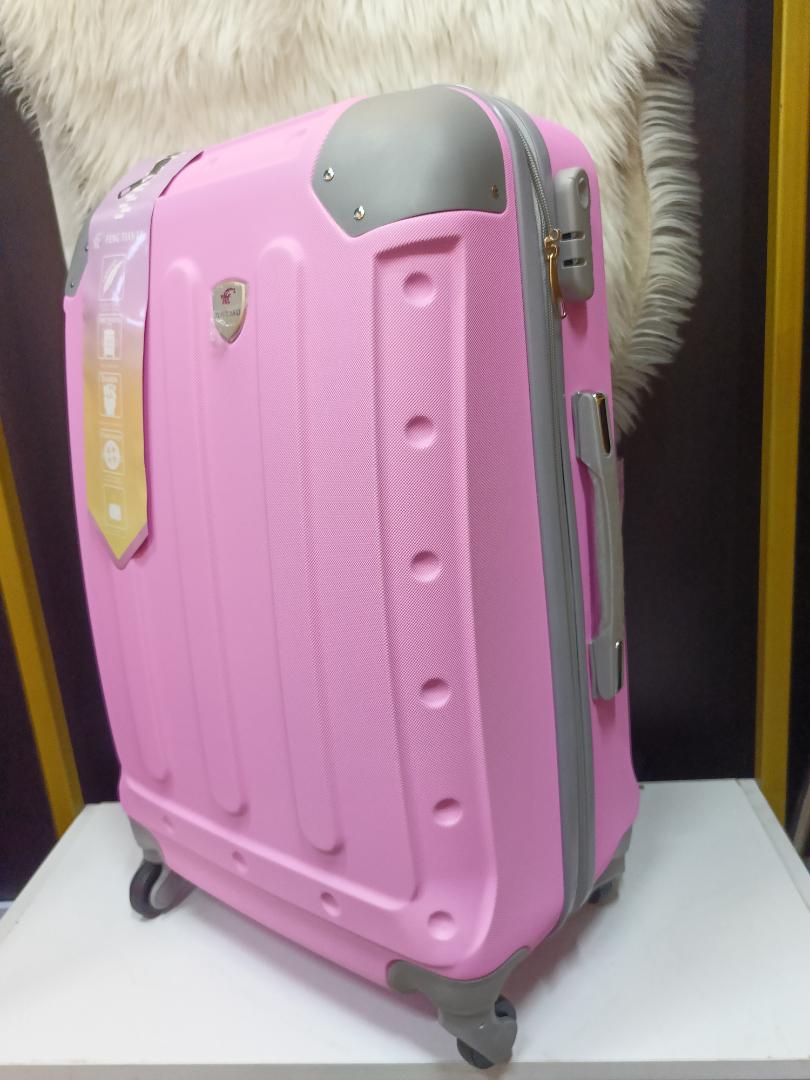 small fibre suitcase with grey corners, has straps