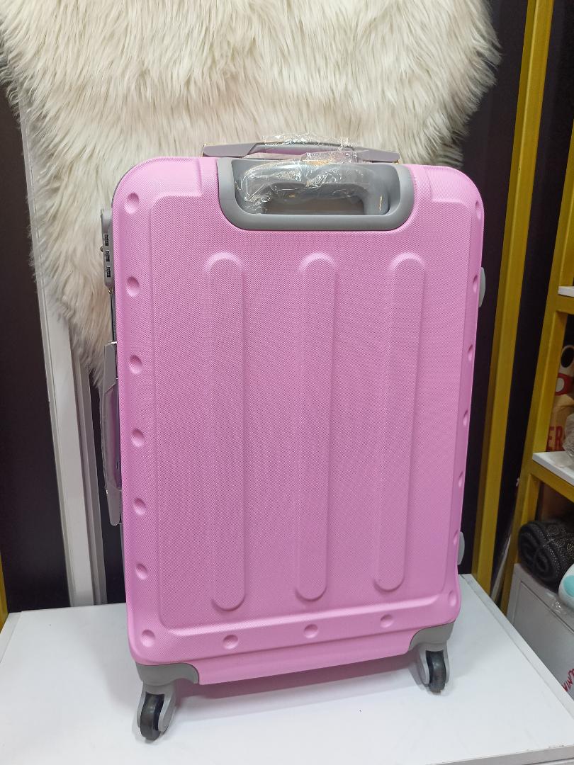 small fibre suitcase with grey corners, has straps