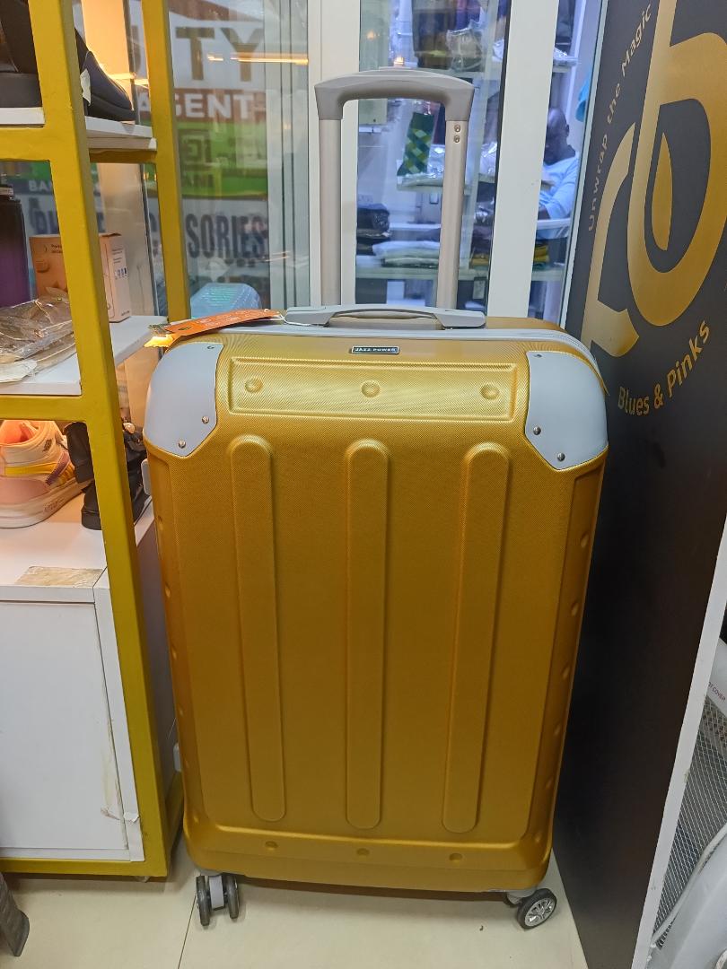 small golden fibre suitcase sold as single