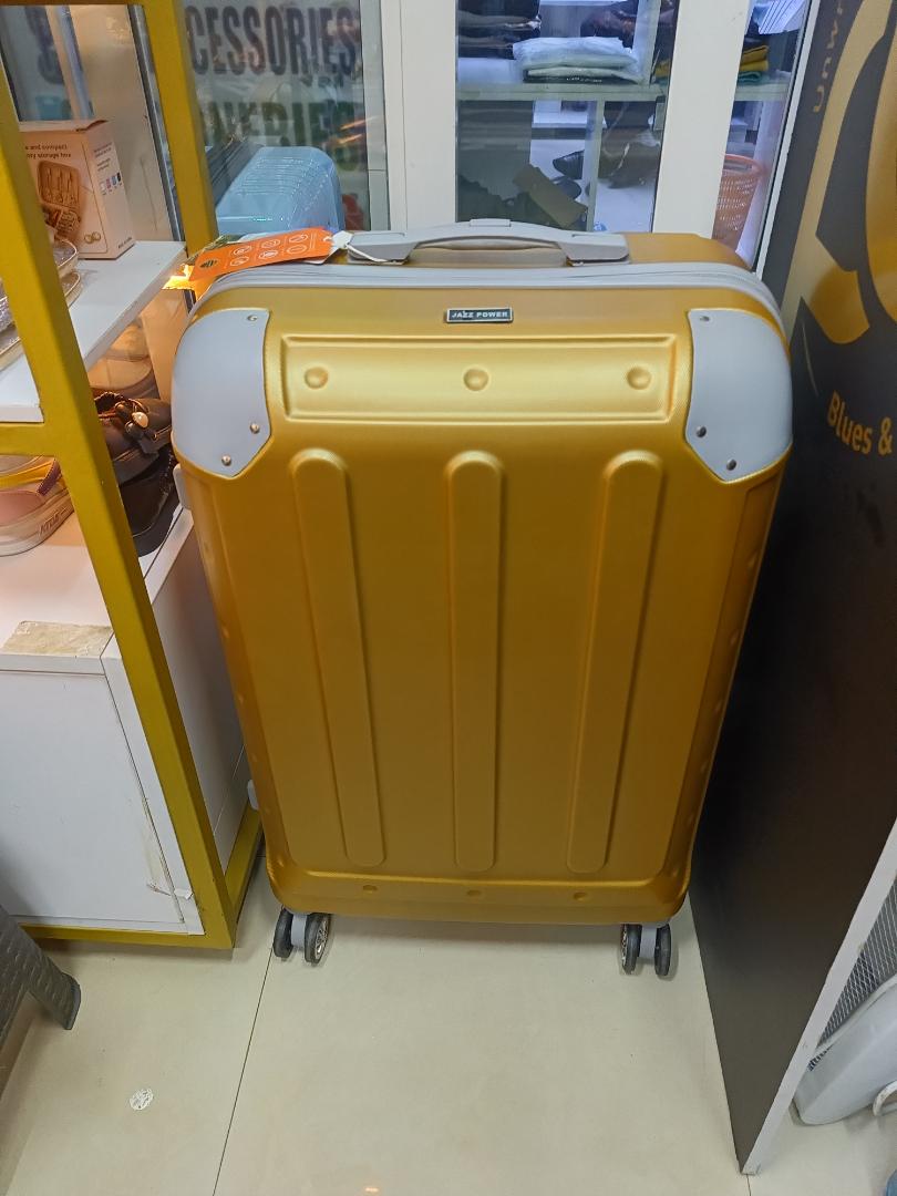 small golden fibre suitcase sold as single