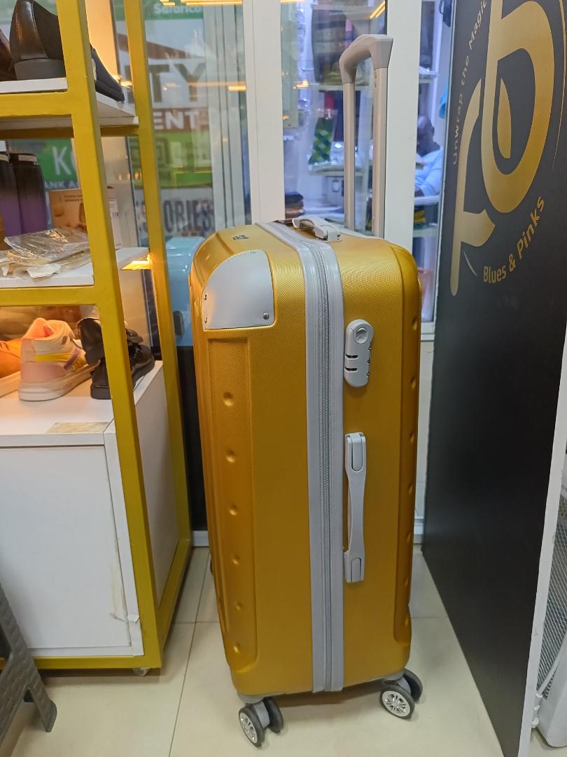 small golden fibre suitcase sold as single