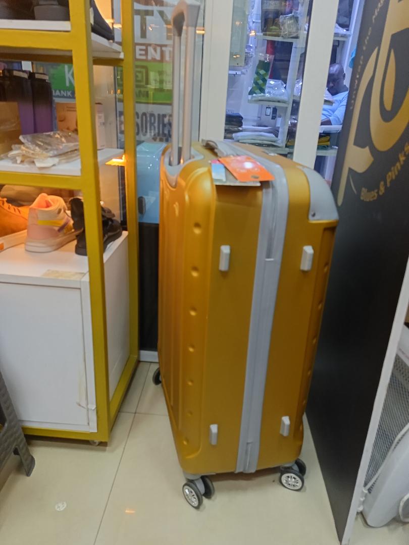small golden fibre suitcase sold as single