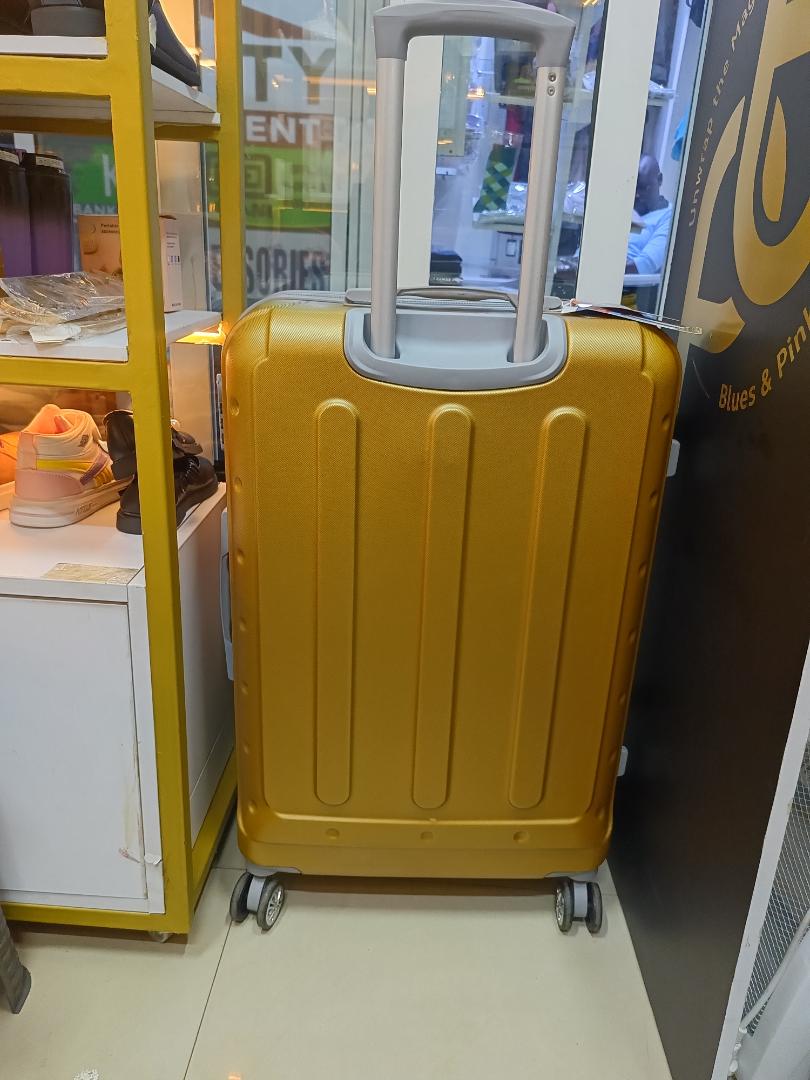 small golden fibre suitcase sold as single
