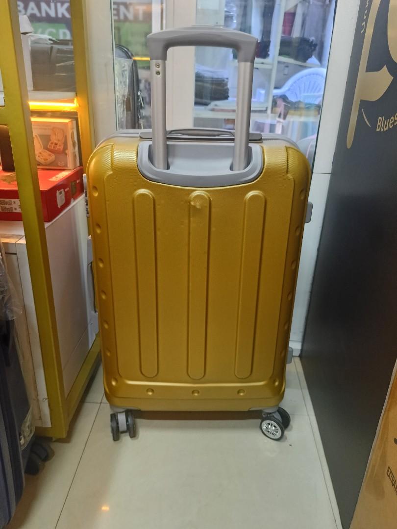 small gokden fibre suitcase with grey corners and with measure of H 47, W 33, L 23