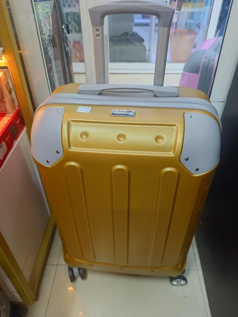 small gokden fibre suitcase with grey corners and with measure of H 47, W 33, L 23