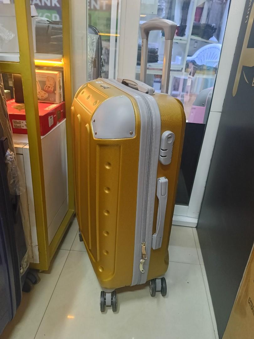 small gokden fibre suitcase with grey corners and with measure of H 47, W 33, L 23