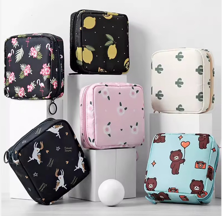 Portable Toiletry Organizer Cosmetic Makeup Pouch Female Napkin Tampon Sanitary Pad Pouch Waterproof Storage Bag for Travel- RANDOM COLOR DISPATCH