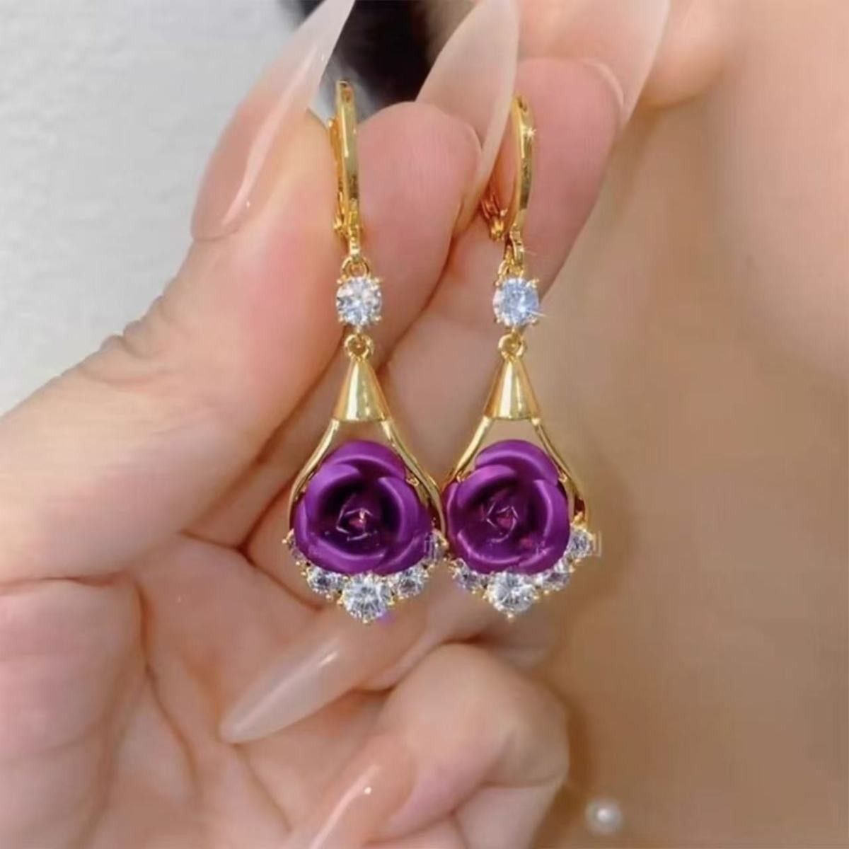 Red rhinestone rose earrings for women, exuding a sophisticated and elegant style. These delicate, dangling earrings are versatile and easy to match.