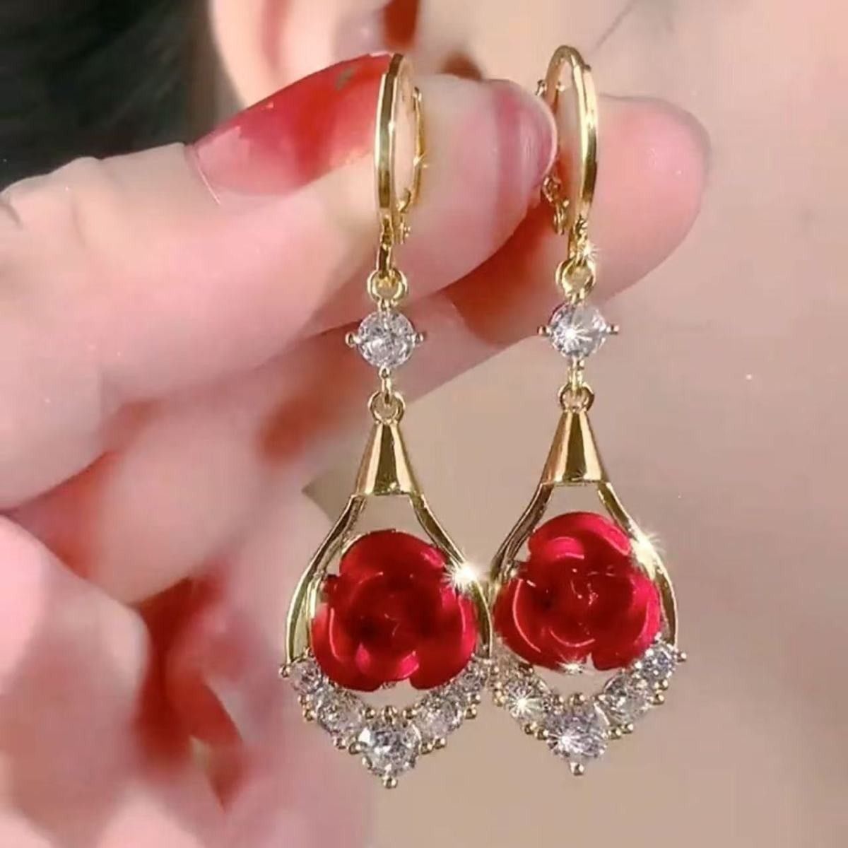 Red rhinestone rose earrings for women, exuding a sophisticated and elegant style. These delicate, dangling earrings are versatile and easy to match.