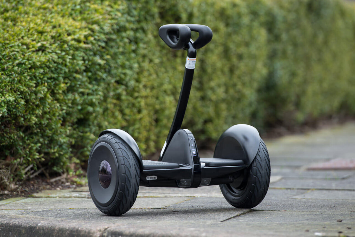 Latest XM-10 Inch Self-Balancing Hoverboard with Handle, Bluetooth Music and LED Lights