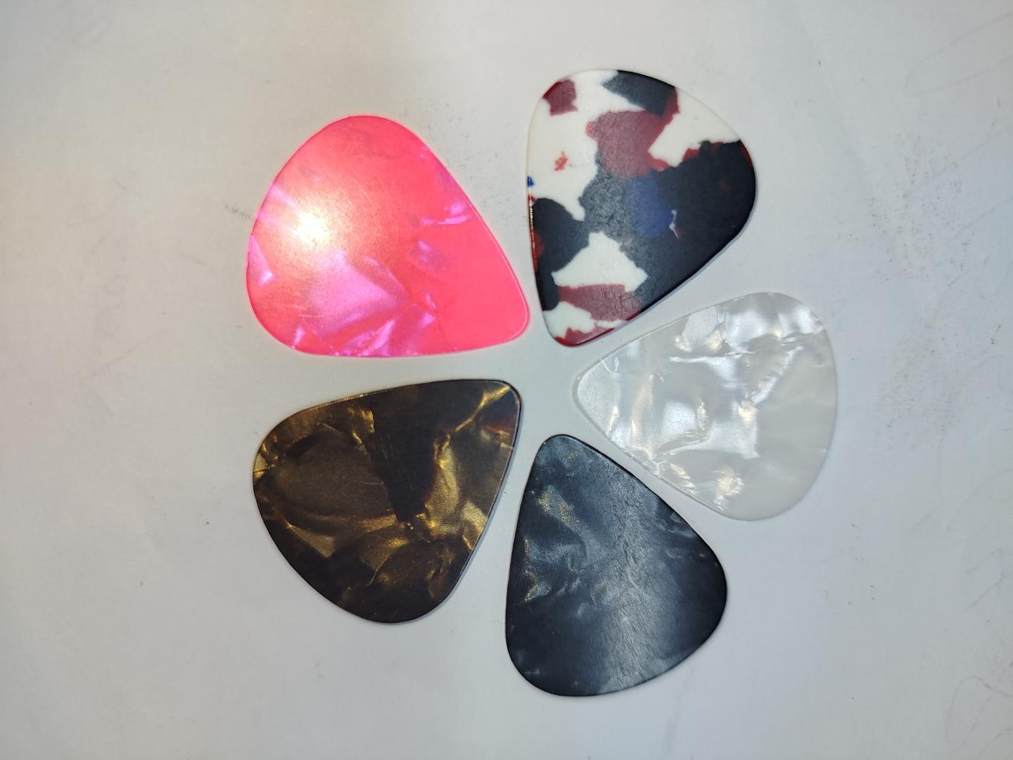 5 Guitar picks/pectrum