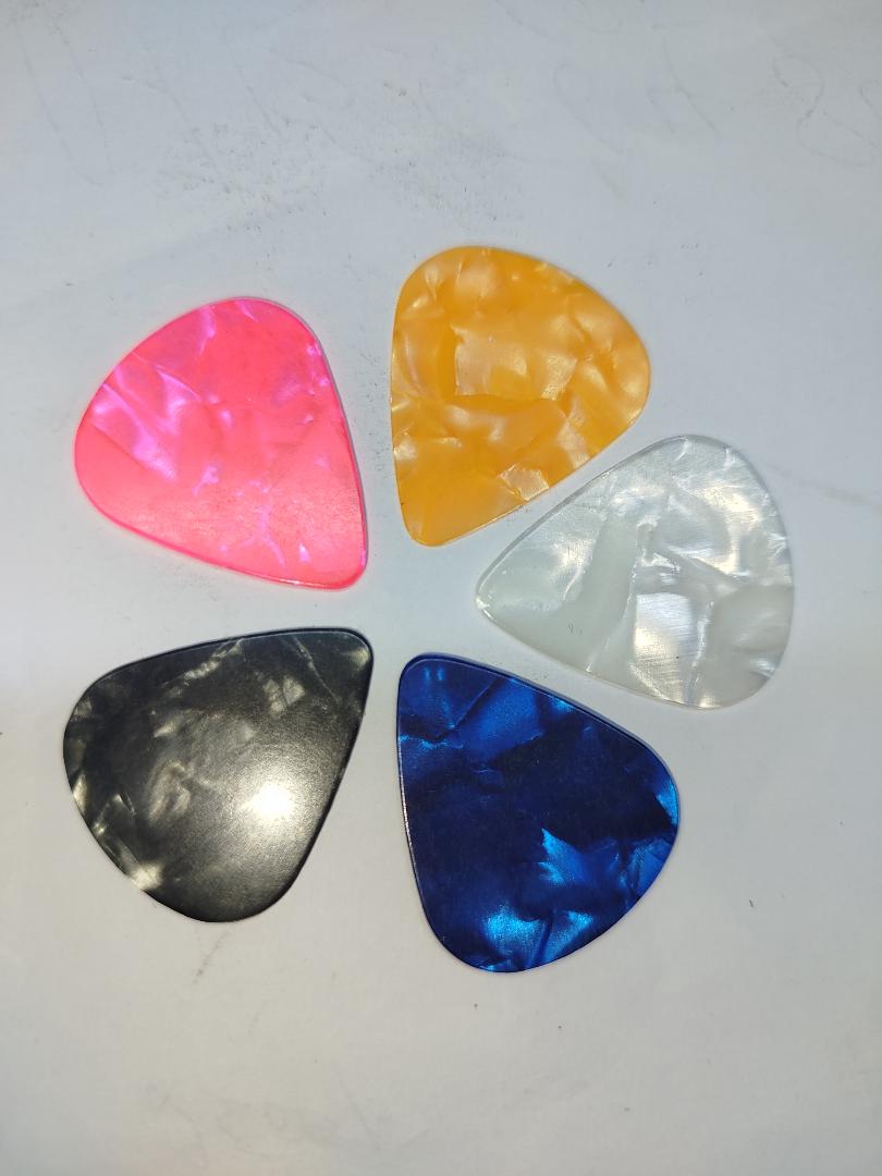 5 Guitar picks/pectrum