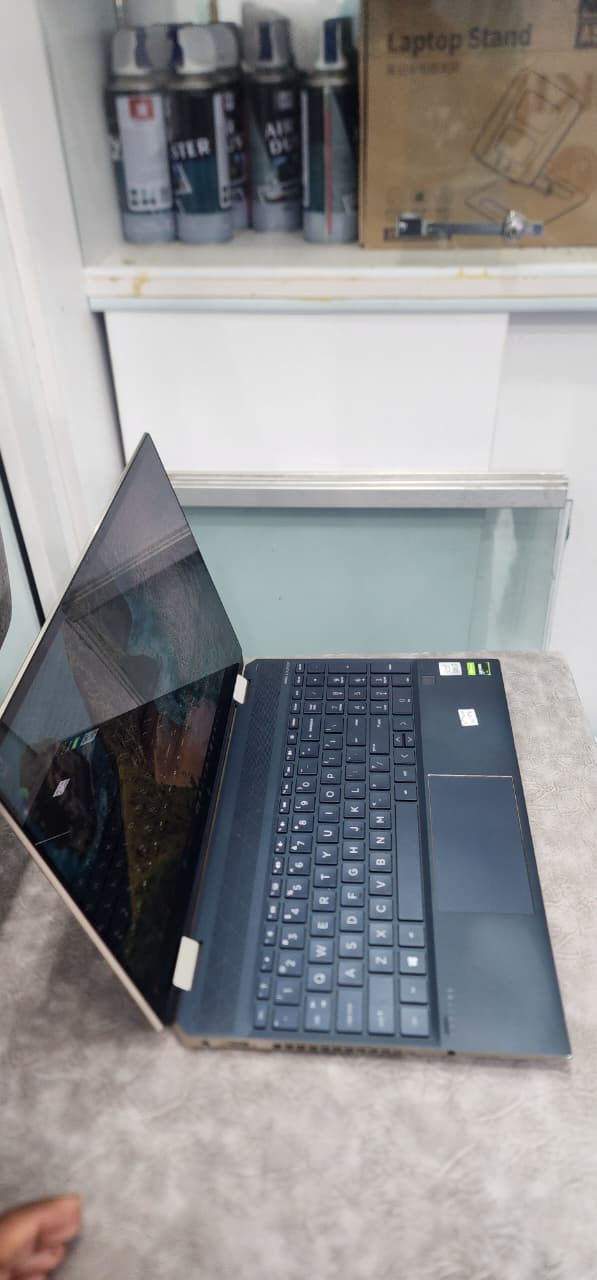 HP Spectre x360 15-bl Convertible – Intel Core i7 8th Gen, 16GB RAM, 512GB SSD, 15.6" Full HD Touchscreen, 2GB NVIDIA Graphics, Premium 2-in-1 Laptop (Brown)