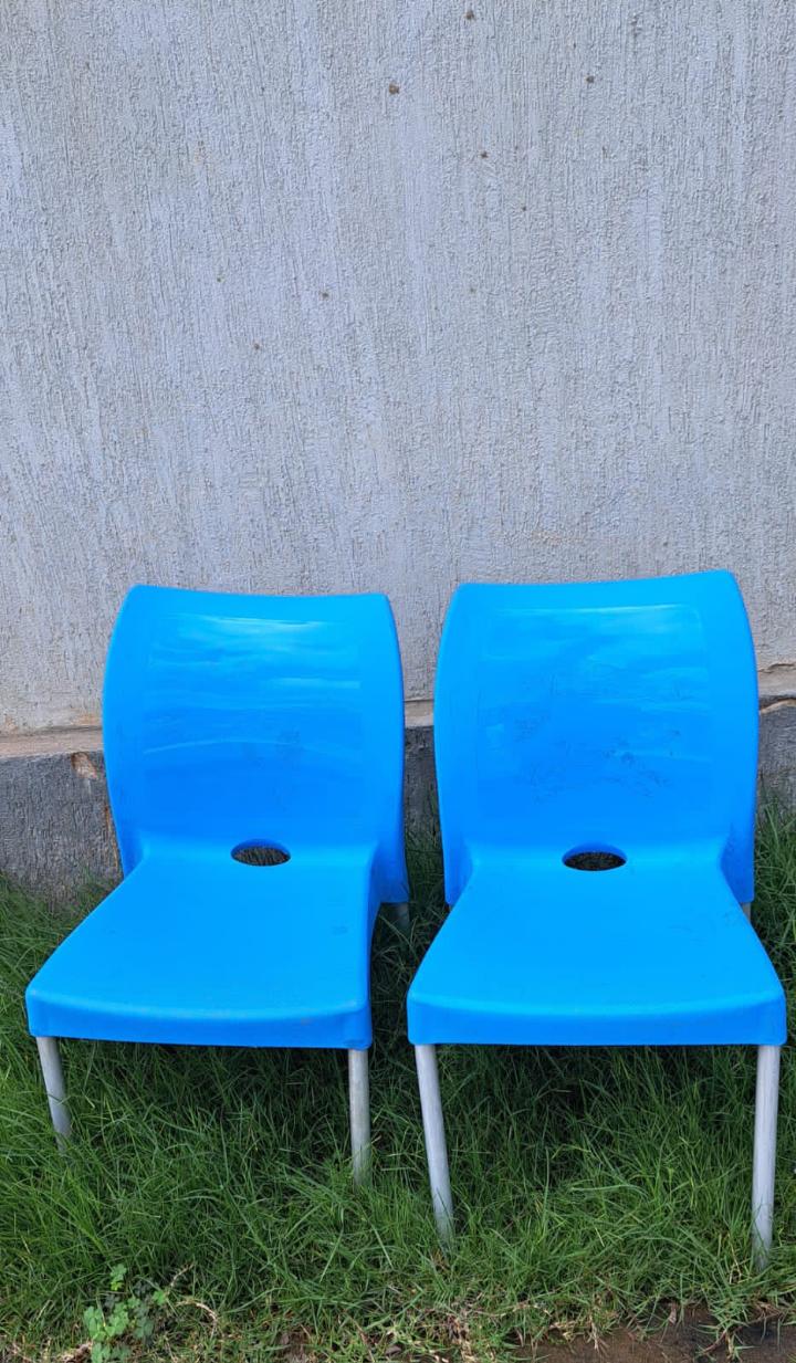 Armless plastic chairs with metal tubing stands