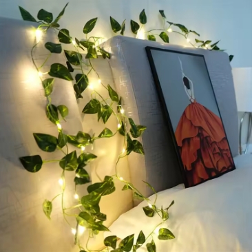 Flower and green leaf string lights, artificial vine fairy lights, battery-powered Christmas tree garland lights, used for weeding and home decoration.