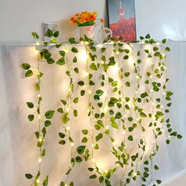 Flower and green leaf string lights, artificial vine fairy lights, battery-powered Christmas tree garland lights, used for weeding and home decoration.