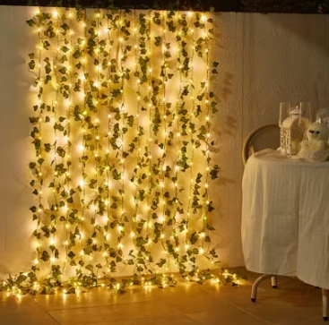 Flower and green leaf string lights, artificial vine fairy lights, battery-powered Christmas tree garland lights, used for weeding and home decoration.