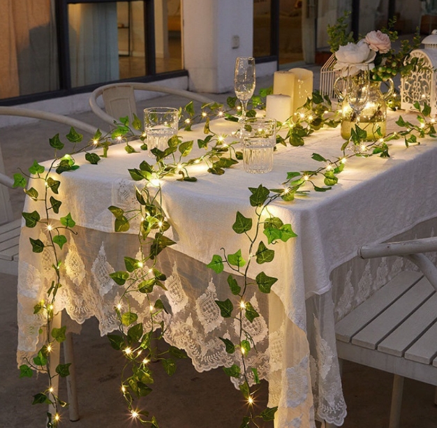 Flower and green leaf string lights, artificial vine fairy lights, battery-powered Christmas tree garland lights, used for weeding and home decoration.