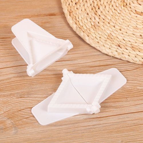 2 Pc Samosa Shaper Ravioli Dumpling Pie Mould Maker. Simply lay the pastry dough gently on top of the mold, fill with recipe filling and clamp down. Makes perfect samosa every time. 
Don't worry about