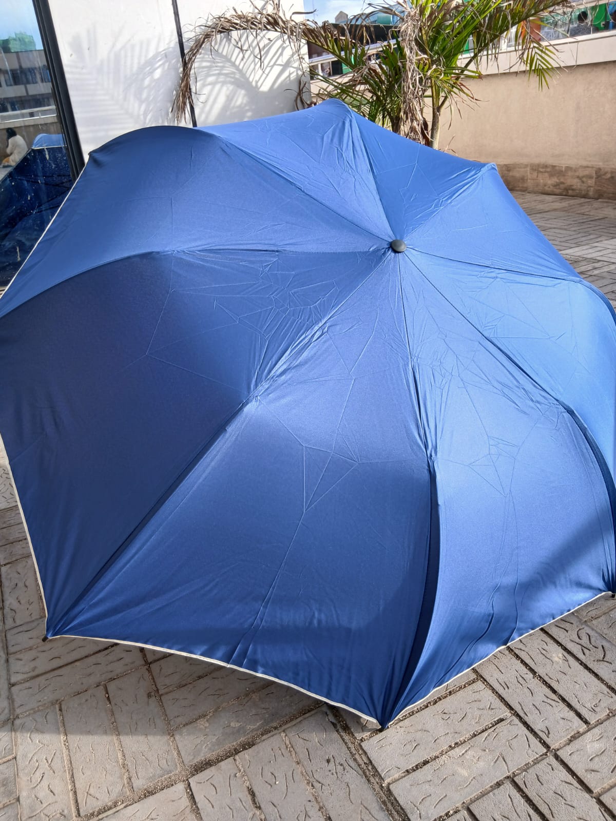 *Foldable Umbrella*

💳 *Price: offer ‼️
▪️Whether it is the heavy rain or the hot sun, this umbrella is your most reliable protective shelter.
▪️ New automatically folding business large umbrella
▪️S