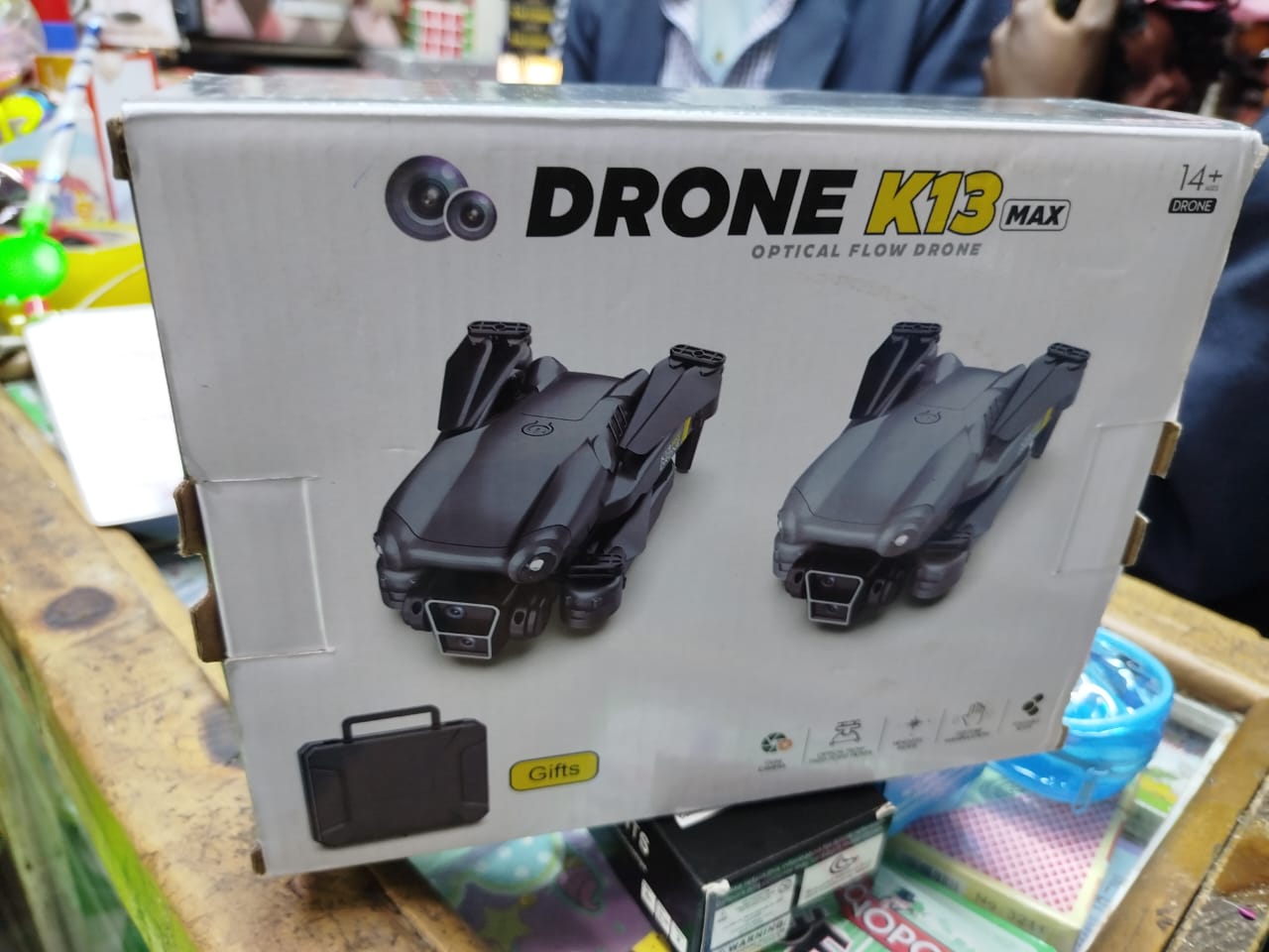 Drone K13 Max, a smart camera drone designed for beginners and hobbyists. 
Features: It includes a camera (often 4K HD dual cameras are an option), Wi-Fi connectivity for real-time image transmission