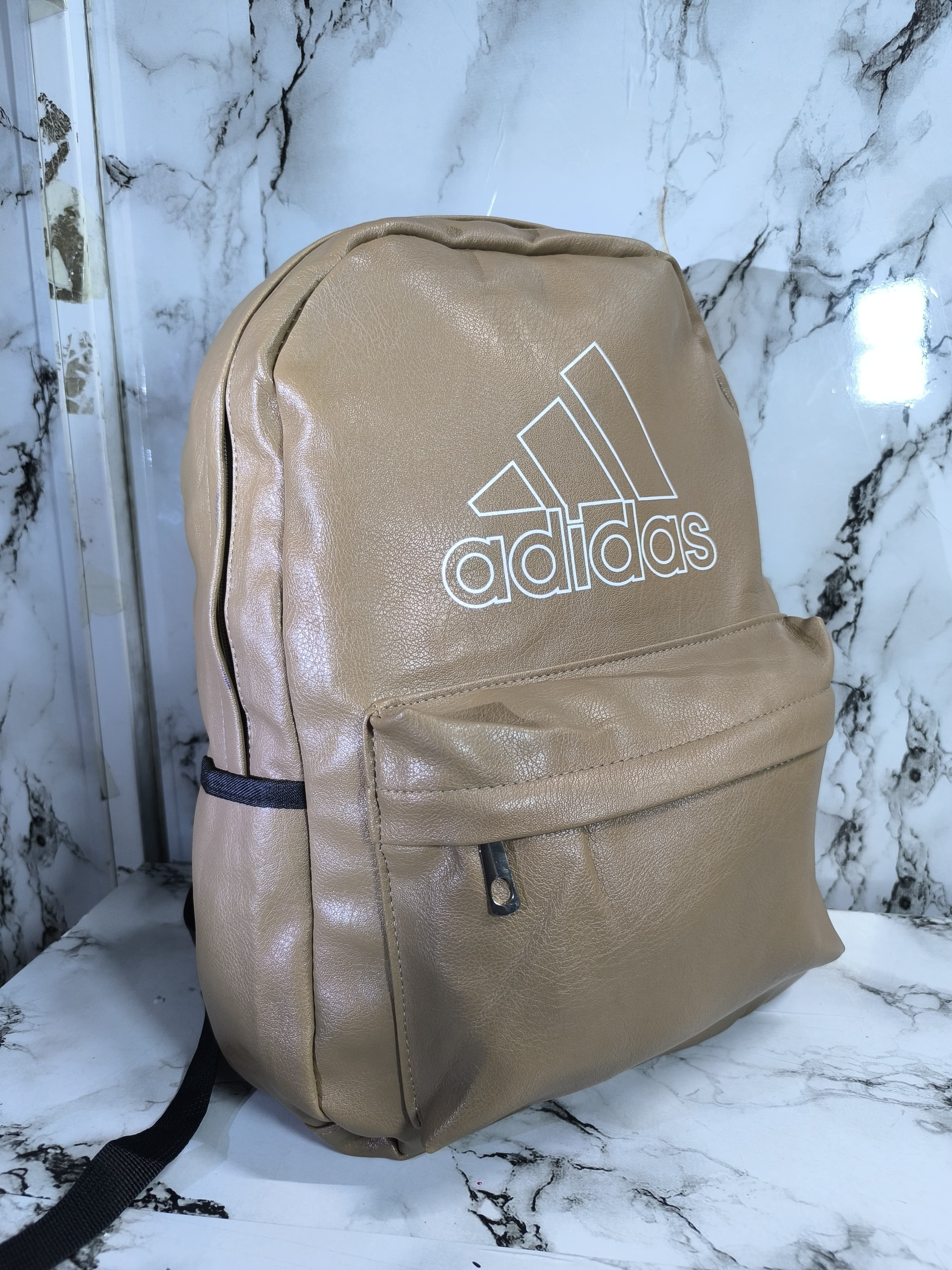 High quality adidas backpack‼️
✅Perfect for school,work and adventure.
✅ Spacious, durable, and laptop-friendly. Grab yours!
✅Perfect gift for a teenage girl/boy

*Colors available: Black, grey, brown