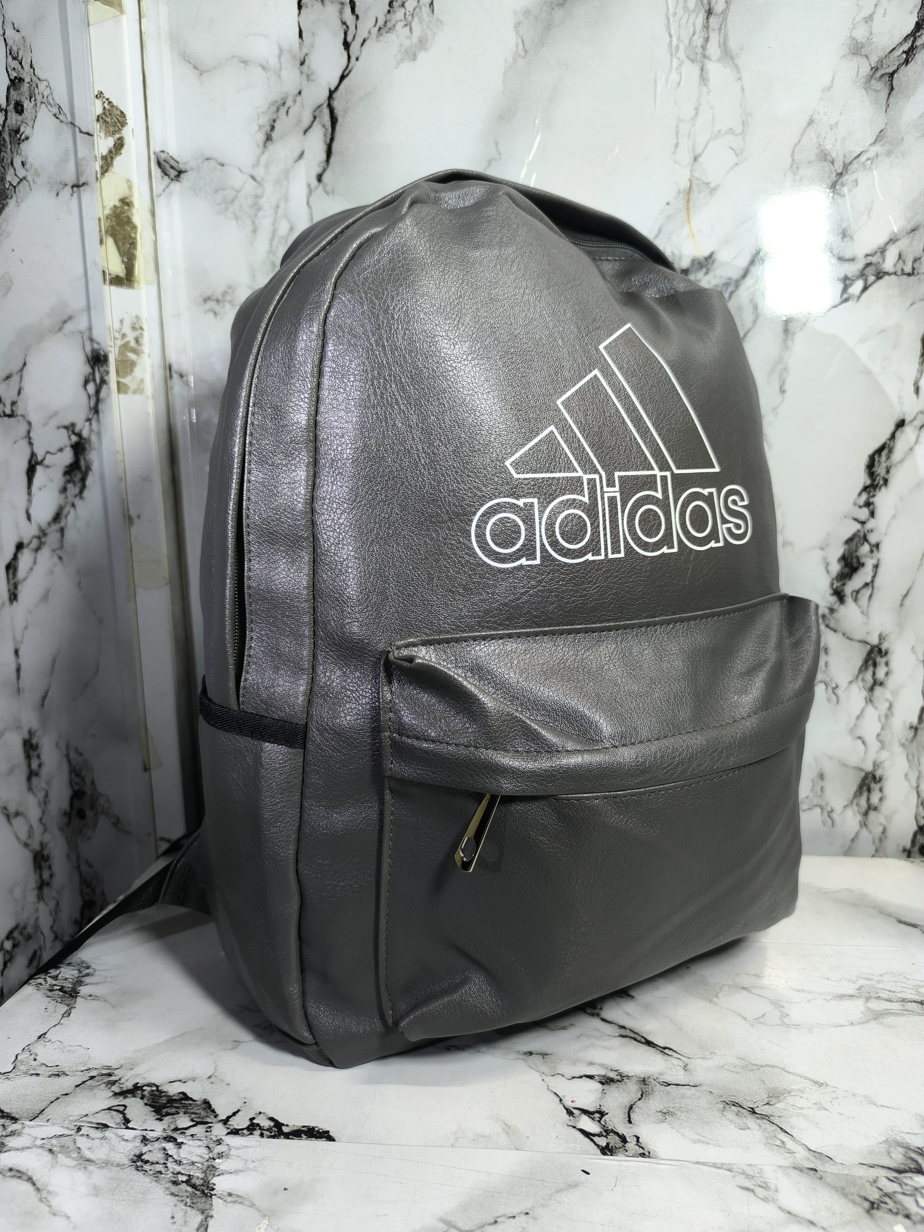 High quality adidas backpack‼️
✅Perfect for school,work and adventure.
✅ Spacious, durable, and laptop-friendly. Grab yours!
✅Perfect gift for a teenage girl/boy

*Colors available: Black, grey, brown