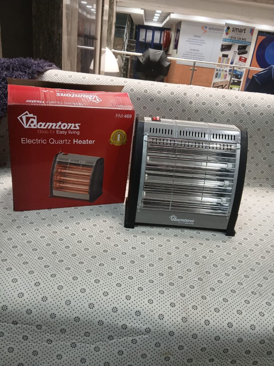 Ramtons RM/469 electric 3-bar quartz heater. This portable and efficient heater provides supplemental warmth. 
It features three quartz heating elements for rapid heat generation. 
The heater offers a