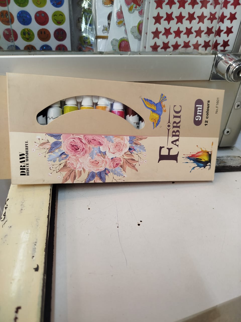 Draw Deduce Wonderful fabric paint. This product is a set of paints specifically formulated for use on textiles and fabrics, providing a permanent and flexible finish that resists cracking or peeling