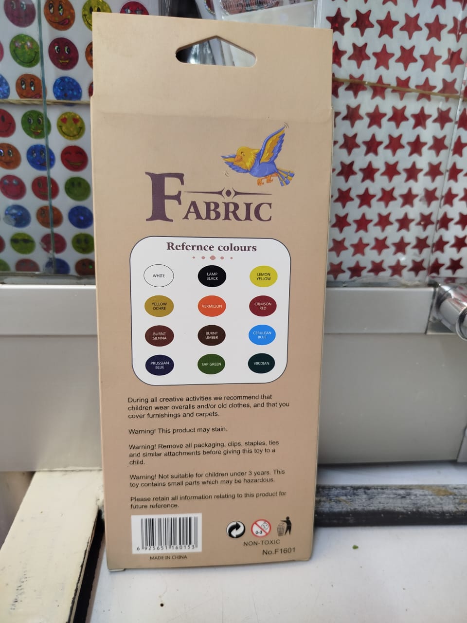 Draw Deduce Wonderful fabric paint. This product is a set of paints specifically formulated for use on textiles and fabrics, providing a permanent and flexible finish that resists cracking or peeling