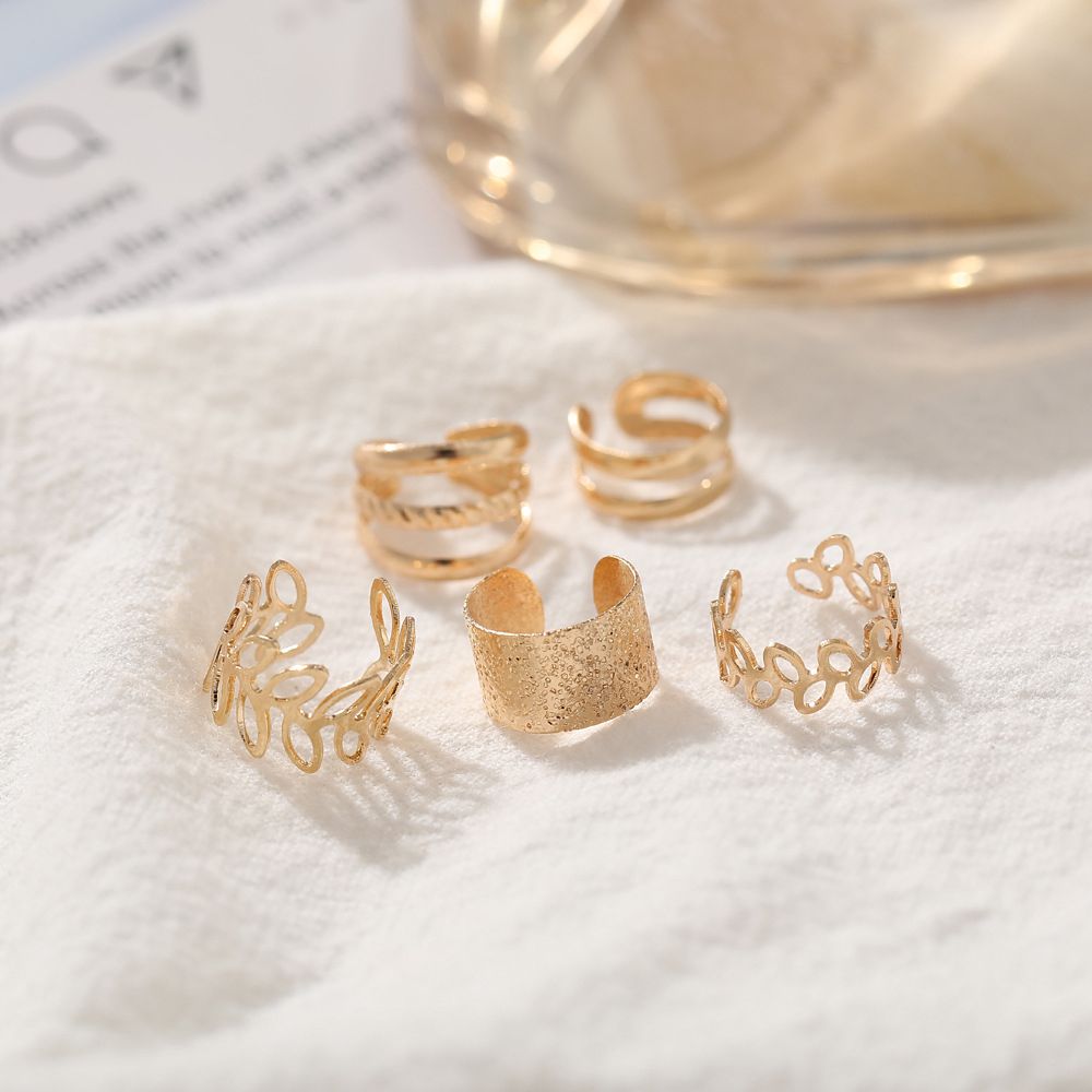 Creative simple no piercing ear bone clip 5-piece personalized gold leaf hollow-out multi-layer earrings C-shaped ear clip has layers