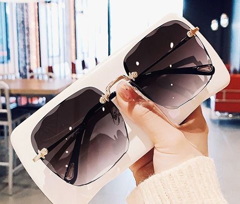 Clearance Sale  sunglasses with a box New frameless cut edge square sunglasses female Korean network red round face slimming anti-UV